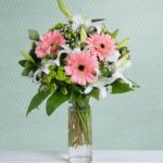 White Lilies with hot pink gerberas