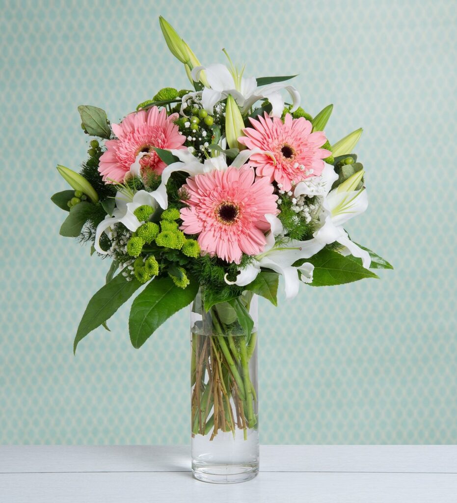 White Lilies with hot pink gerberas