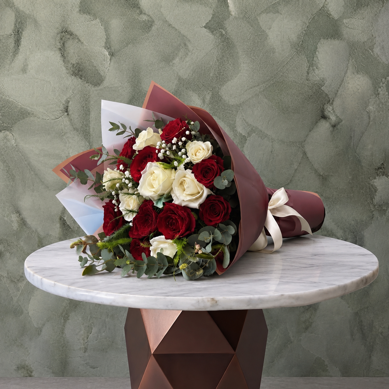 Red & White Roses - جوري الاحمر والابيض Red and white roses amman bouquet featuring striking red and white roses with eucalyptus leaves in elegant wrapping.