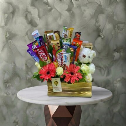 A chocolate flowers teddy bear box containing 15 pieces of chocolates in Amman-بوكس شوكولاتة وزهور ودبدوب
