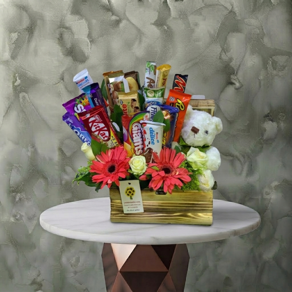 Chocolate and Flowers Bear in a Box in Amman-بوكس شوكولاتة وزهور ودبدوب A chocolate flowers teddy bear box containing 15 pieces of chocolates in Amman-بوكس شوكولاتة وزهور ودبدوب