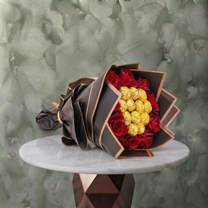 باقة الورد وفيريرو روشيه بتغليف أسود فاخر مع ورود حمراء وشوكولاتة في عمان- Red rose ferrero bouquet wrapped in luxury black and copper paper in Amman.