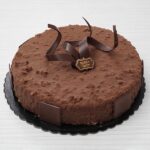 Ferrero Rocher Mousse Cake - A chocolate cake layer coated with a layer of mousse Ferrero,