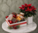 صندوق هدايا بهجة الكريسماس يحتوي على شوكولاتة سويس وتزيين عيد الميلاد في عمان-Christmas delight gift box filled with Sweiss chocolates and holiday ornaments in Amman