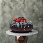 A classic homemade cake with chocolate and fresh strawberries serving 8 people from Cake Shop in Amman-كيك منزلي كلاسيك في عمان