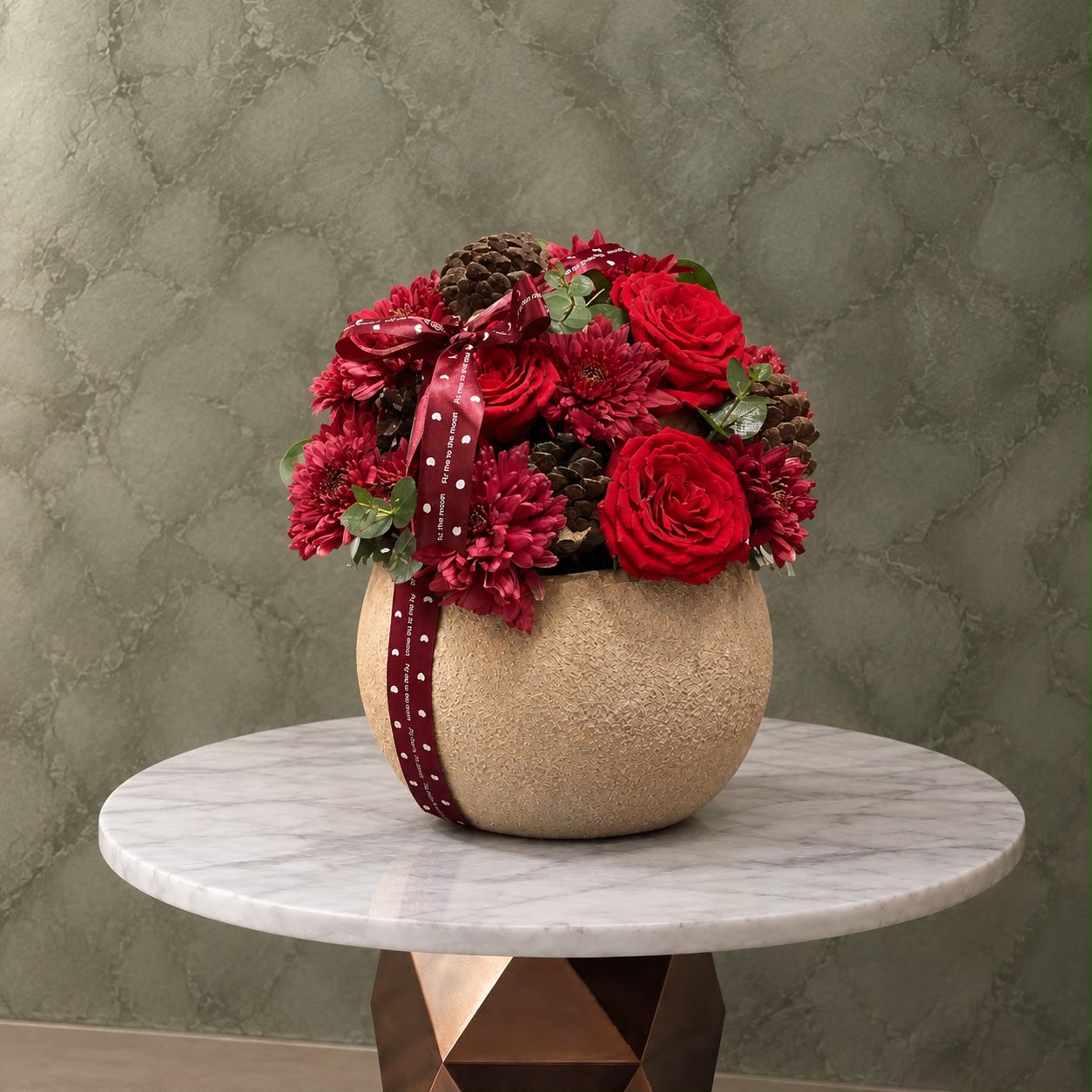 Moonlit Red Elegance in Amman-زهور القمر الحمراء في عمان A red rose stone jar elegantly arranged in Amman-جرة ورد جوري أحمر بتصميم أنيق داخل إناء حجري في عمان.