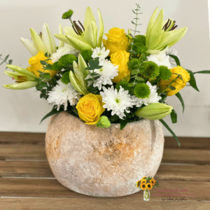 yellow roses woth withe lilis in jar send flowers to amman with jasmine gift amman